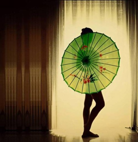 Behind umbrella  via theagnosticpagan (tumblr).jpg