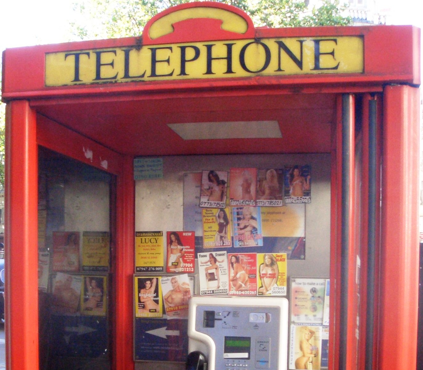 Phone_box_prostitute_calling_cards_1_crop.jpg