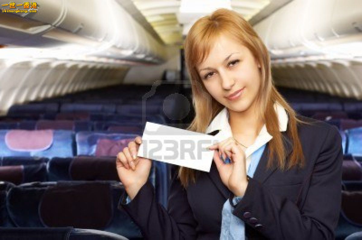 792214-blond-air-hostess-stewardess-in-the-empty-airliner-cabin.jpg