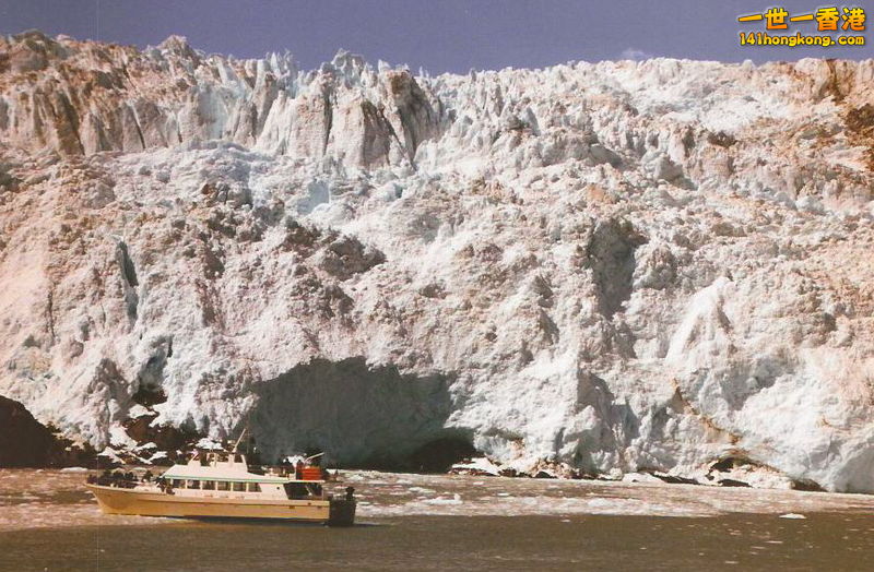 Sightseeing boat in front of a tidewater glacier, Kenai Fjords National Park, Alaska.jpg