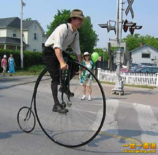 Man_on_Huge_Bicycle.jpg