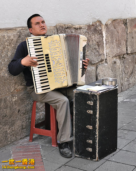 479px-Quito_Accordion_player.jpg