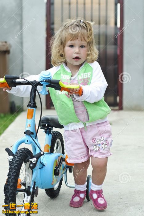 little-girls-bicycle-14584251.jpg