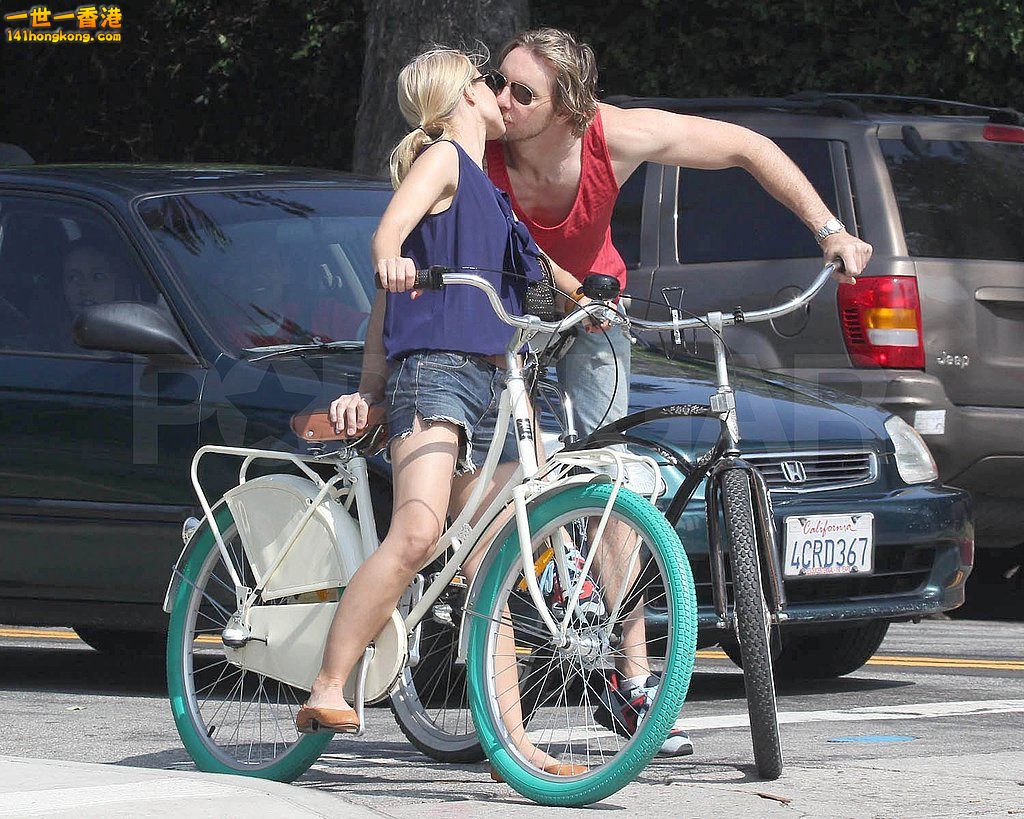 Kristen-Dax-stopped-bikes-share-kiss.JPG