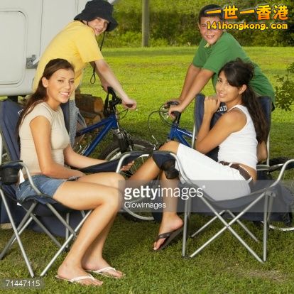 71447115-portrait-of-two-boys-sitting-on-bicycles-with-gettyimages.jpg