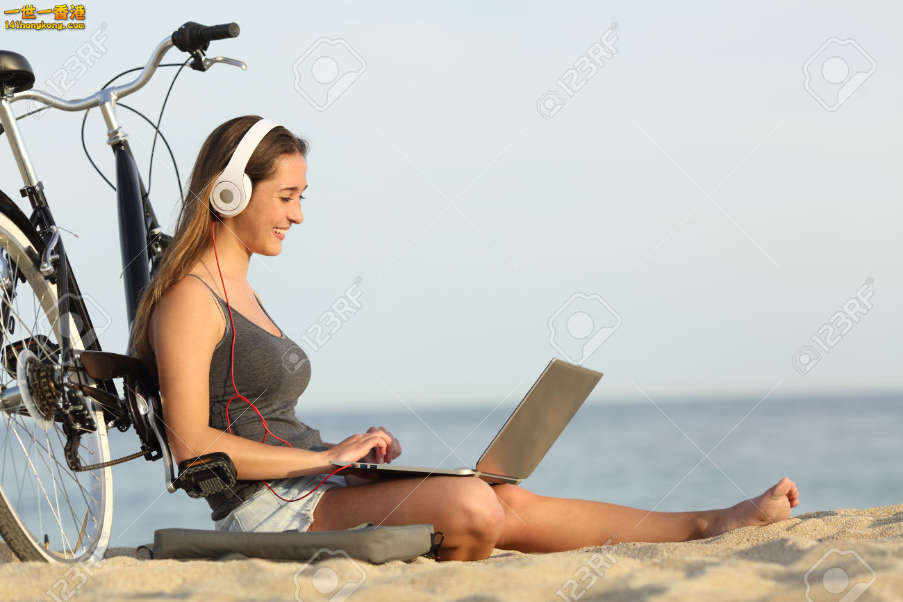 41597993-Teen-girl-studying-with-a-laptop-on-the-beach-leaning-on-a-bicycle-Stoc.jpg