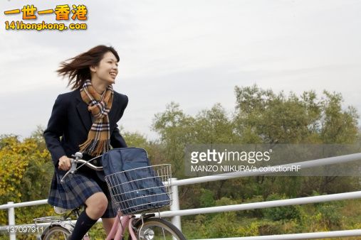 137097911-high-school-girl-riding-a-bicycle-gettyimages.jpg