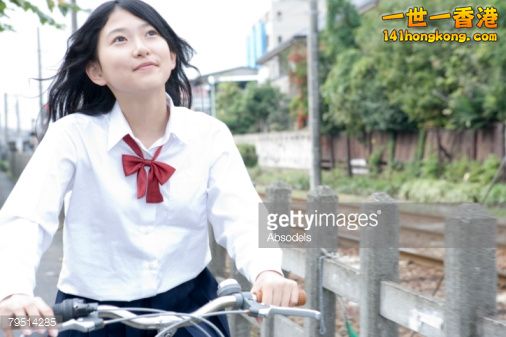 79514285-high-school-girl-riding-bicycle-gettyimages.jpg