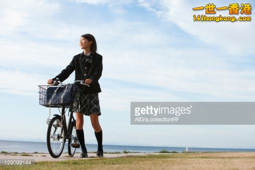 129099144-junior-high-school-girl-with-a-bicycle-gettyimages.jpg