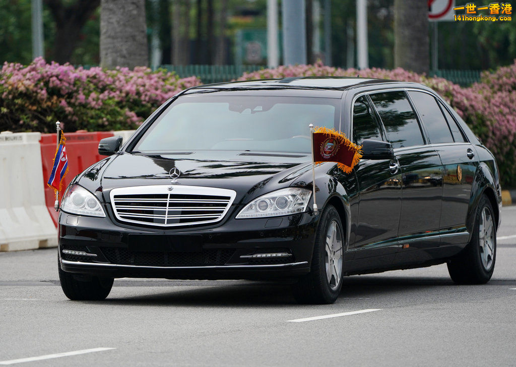 A-vehicle-believed-to-be-carrying-North-Koreas-leader-Kim-Jong-Un-travels-past.jpg