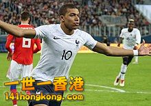 220px-Kylian_Mbappe_celebrating_-_March_2018.jpg