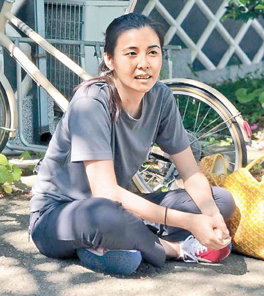 獨愛福岡的Yoyo，工作時愛以單車代步。.jpg