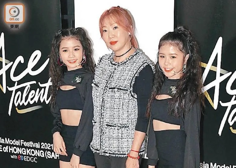 唐安麒睇好孖妹參賽者。.jpg