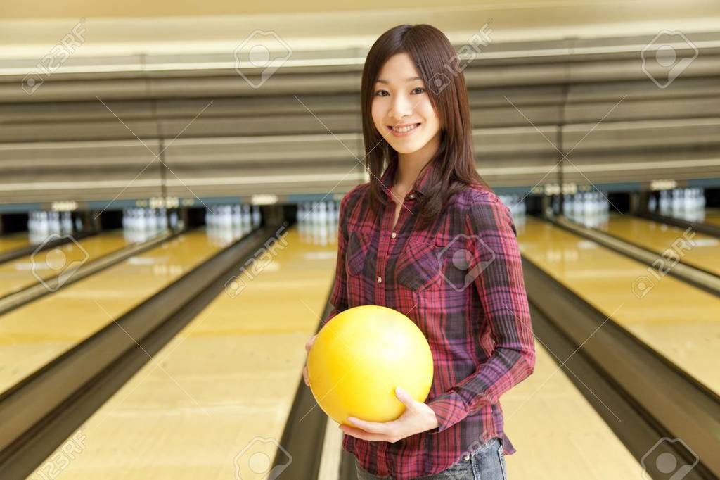 49270705-women-with-a-bowling-ball.jpg