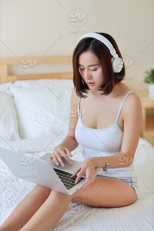 stock-photo-business-adult-working-lifestyle-beautiful-headphone-computer-sexy-a.jpg