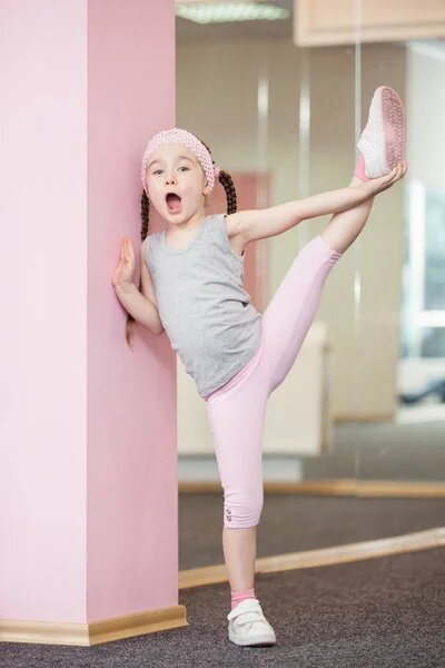 depositphotos_156217398-stock-photo-girl-child-doing-fitness-exercises.jpg