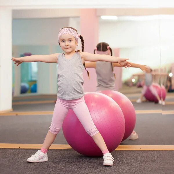 depositphotos_156217294-stock-photo-girl-child-doing-fitness-exercises.jpg