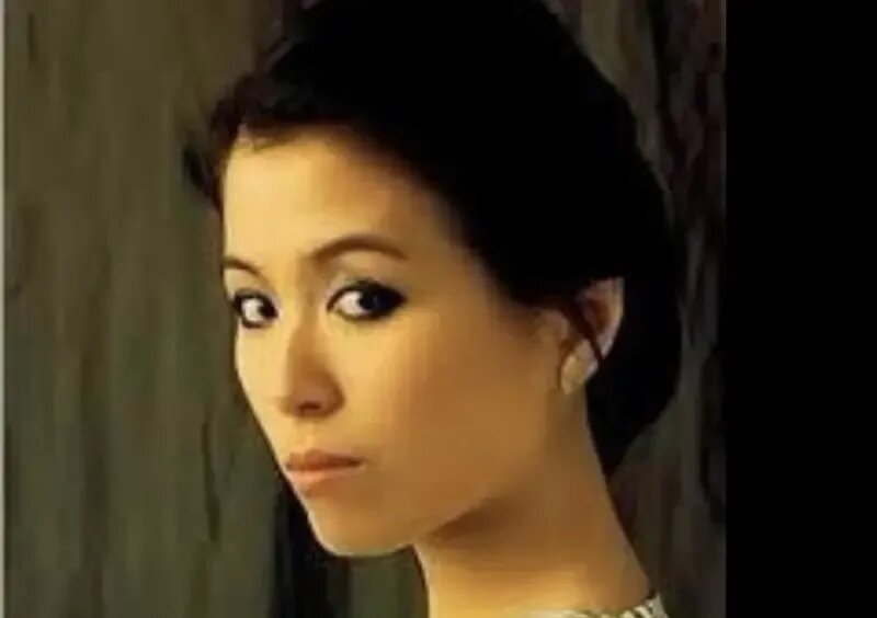 2  繆騫人曾是在香港娛樂圈走紅的氣質女星，和周潤發、謝賢等都傳過緋聞。.jpg