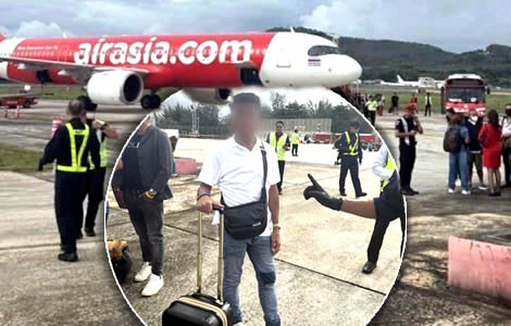 thai-man-arrested-and-charged-after-joke-about-bomb-in-the-bag-as-air-asia-fligh.jpg