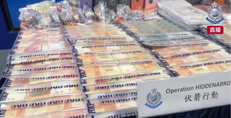 1 警方偵破三合會社團洗黑錢犯罪活動，共拘捕 82 人，共凍結 11.3 億元，並檢獲約 826.jpg