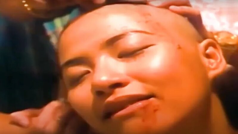 2 麥家琪曾於《龍虎砵蘭街》一片剃光頭演出.jpg