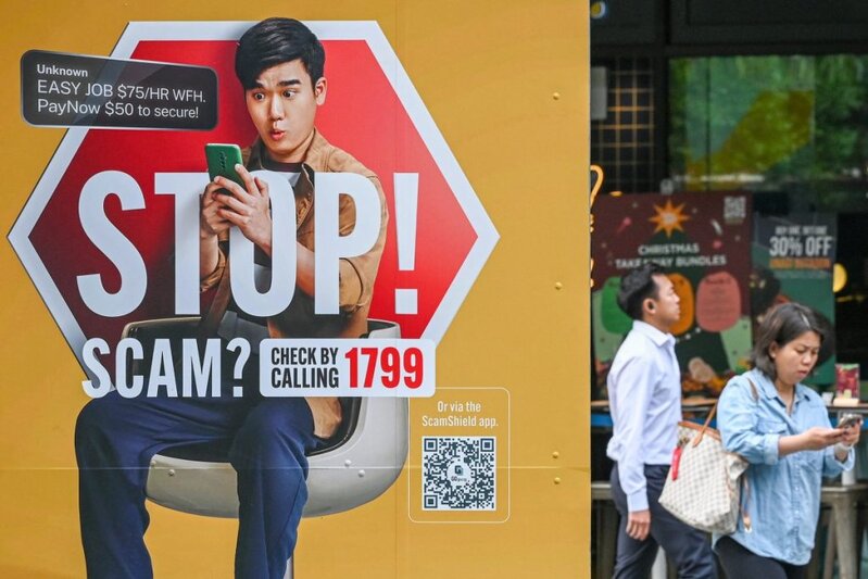 AFP__20251230__886Y8G3__v1__MidRes__SingaporeCrimeScam.jpg