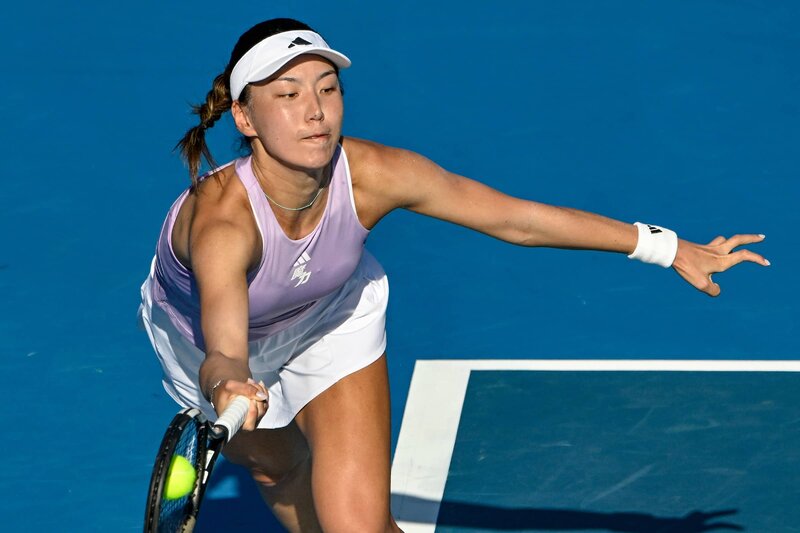 wang-stretch-forehand.JPG