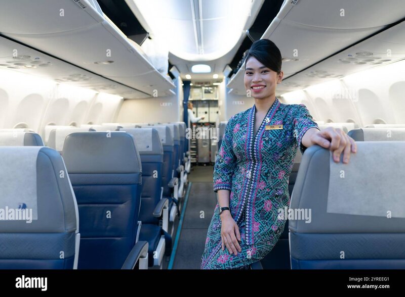 kuala-lumpur-malaysia-december-08-2023-stewardess-on-a-malaysia-airlines-boeing-.jpg