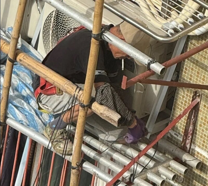 竹園南邨男工棚架上吸煙開工遭網民炮轟　房屋署：已即時派員上門跟進.jpg